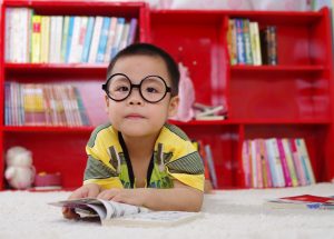 Kid reading the book